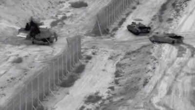 Israeli armoured vehicles take part in an operation, as the conflict between Israel and Hamas continues, at a location given as the northern Gaza Strip (via REUTERS)