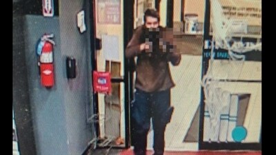 Androscoggin County Sheriff's Office released photos of the alleged suspect carrying a gun, seeking help to identify him (Androscoggin County Sheriff's Office/Facebook) Androscoggin County Sheriff's Office released photos of the alleged suspect carrying a gun, seeking help to identify him (Androscoggin County Sheriff's Office/Facebook)