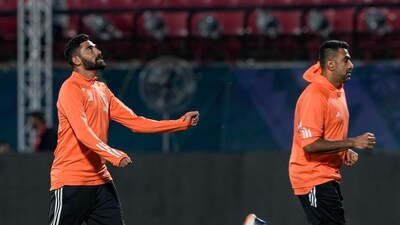 Mohammed Siraj and R Ashwin during a practice session at HPCA Stadium (PTI) Mohammed Siraj and R Ashwin during a practice session at HPCA Stadium (PTI)