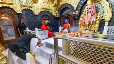 Prime Minister Narendra Modi on Thursday performed puja at the revered Shri Saibaba Samadhi Temple in Shirdi and offered prayers there. (PTI) Prime Minister Narendra Modi on Thursday performed puja at the revered Shri Saibaba Samadhi Temple in Shirdi and offered prayers there. (PTI)