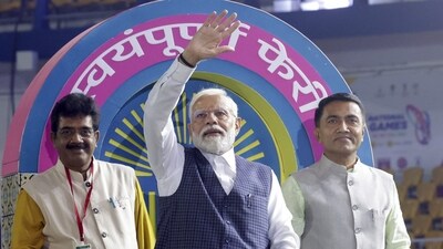 Prime Minister Narendra Modi with Goa Chief Minister Pramod Sawant during the opening ceremony of the 37th National Games, at Pandit Jawaharlal Nehru Stadium in Goa (PTI) Prime Minister Narendra Modi with Goa Chief Minister Pramod Sawant during the opening ceremony of the 37th National Games, at Pandit Jawaharlal Nehru Stadium in Goa (PTI)