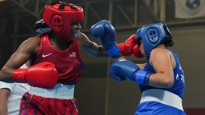 Morelle McCane of the United States, left, fights Costa Rica's Nicole Vega during a Pan American Games women's boxing 66kg quarterfinals bout in Santiago, Chile, Tuesday, Oct. 24, 2023. (AP Photo/Dolores Ochoa) (AP) Morelle McCane of the United States, left, fights Costa Rica's Nicole Vega during a Pan American Games women's boxing 66kg quarterfinals bout in Santiago, Chile, Tuesday, Oct. 24, 2023. (AP Photo/Dolores Ochoa) (AP)