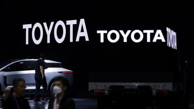 Signage displayed in the Toyota Motor Corp. booth at the Japan Mobility Show in Tokyo, Japan, on Wednesday, Oct. 25, 2023. (Bloomberg)