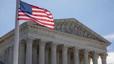 A US flag flies at half-staff. (Bloomberg) A US flag flies at half-staff. (Bloomberg)