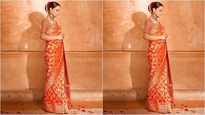 Just a day back, Kangana served major festive fashion goal with her mesmerising silk saree look featuring a captivating orange shade adorned with intricate gold embroidery and a matching blouse with elbow-length sleeves and sweetheart neck. (Instagram/@kanganaranaut) Just a day back, Kangana served major festive fashion goal with her mesmerising silk saree look featuring a captivating orange shade adorned with intricate gold embroidery and a matching blouse with elbow-length sleeves and sweetheart neck. (Instagram/@kanganaranaut)