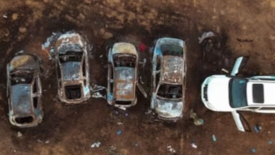 An aerial view shows the burnt cars of festival-goers at the site of an attack on the Nova Festival by Hamas gunmen from Gaza, near Israel's border with the Gaza Strip, in southern Israel, October 12, 2023 (REUTERS/Ilan Rosenberg)