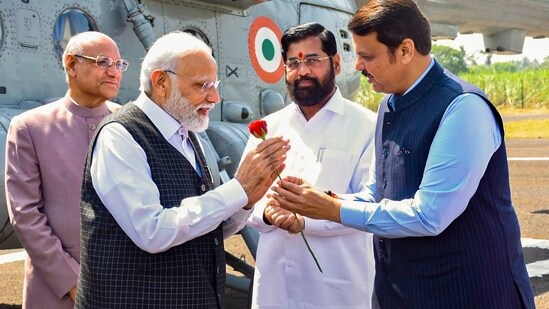 PM Modi was received by Maharashtra Governor Ramesh Bais, the Chief Minister Eknath Shinde and Deputy Chief Minister Devendra Fadnavis upon his arrival in Shirdi.(PTI)