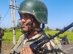 Border Security Force (BSF) personnel stand guard near India-Pakistan border. 