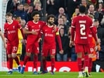 Liverpool's Mohamed Salah, centre, celebrates after scoring his side's fifth goal during the Europa League Group E soccer match vs Toulouse, at Anfield
