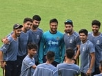 Bangladesh's captain Shakib Al Hasan (C) poses for a photograph with local net bowlers during a practice session on the eve of their 2023 ICC Men's Cricket World Cup one-day international (ODI) match against Netherlands Bangladesh's captain Shakib Al Hasan (C) poses for a photograph with local net bowlers during a practice session on the eve of their 2023 ICC Men's Cricket World Cup one-day international (ODI) match against Netherlands