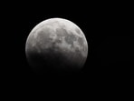 In partial eclipses, the Earth's shadow typically appears quite dark on the Moon's side. However, what observers see from Earth is contingent on the alignment of the Sun, Earth, and Moon.&nbsp;(HT Photo/Satyabrata Tripathy)