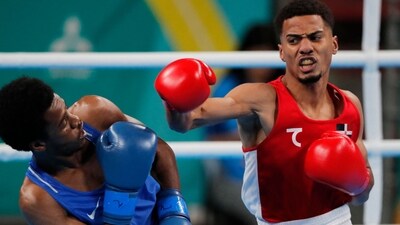 Brazil's Luiz Gabriel Do Nascimento Chalot Oliveira (L) fights against US' Jahmal Harvey in the men's 57kg semifinals bout boxing event during the Pan American Games Santiago 2023 at the Olympic Training Centre (CEO) in Santiago on October 26, 2023. (Photo by Javier TORRES / AFP) (AFP) Brazil's Luiz Gabriel Do Nascimento Chalot Oliveira (L) fights against US' Jahmal Harvey in the men's 57kg semifinals bout boxing event during the Pan American Games Santiago 2023 at the Olympic Training Centre (CEO) in Santiago on October 26, 2023. (Photo by Javier TORRES / AFP) (AFP)