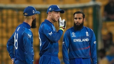 England's captain Jos Buttler with teammates during the ICC Men's Cricket World Cup 2023 match between England and Sri Lanka, at M. Chinnaswamy Stadium, in Bengaluru (PTI) England's captain Jos Buttler with teammates during the ICC Men's Cricket World Cup 2023 match between England and Sri Lanka, at M. Chinnaswamy Stadium, in Bengaluru (PTI)