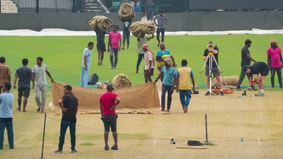 Groundsmen cover the pitch on the eve of the ICC Men's Cricket World Cup 2023 match between Bangladesh and Netherlands, at Eden Gardens in Kolkata (PTI) Groundsmen cover the pitch on the eve of the ICC Men's Cricket World Cup 2023 match between Bangladesh and Netherlands, at Eden Gardens in Kolkata (PTI)