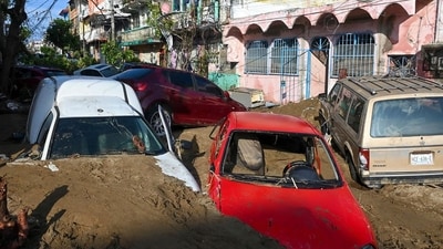 The Mexican government dispatched approximately 10,000 troops to address the aftermath of the disaster. However, the arrival of the necessary equipment for clearing streets blocked by large amounts of mud and fallen trees was notably delayed. (AFP) The Mexican government dispatched approximately 10,000 troops to address the aftermath of the disaster. However, the arrival of the necessary equipment for clearing streets blocked by large amounts of mud and fallen trees was notably delayed. (AFP)