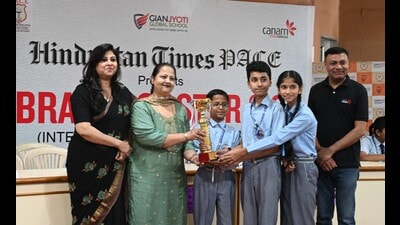 The team from Moti Ram Arya School, Sector 27, Chandigarh, comprising Shubhi Dubey, Sarthak and Gautam Soni won the first prize. (Sanjeev Sharma?HT) The team from Moti Ram Arya School, Sector 27, Chandigarh, comprising Shubhi Dubey, Sarthak and Gautam Soni won the first prize. (Sanjeev Sharma?HT)