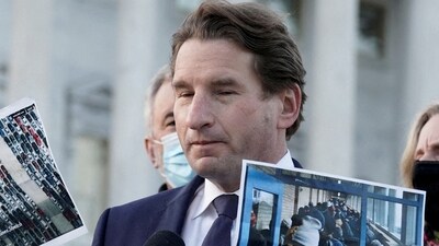 FILE PHOTO: Rep. Dean Phillips (D-MN) with the Problem Solvers Caucus and other members, speaks at a news conference on the forthcoming passage of the bipartisan emergency COVID-19 relief bill in Washington, D.C., U.S., December 21, 2020. REUTERS/Ken Cedeno/File Photo (REUTERS)