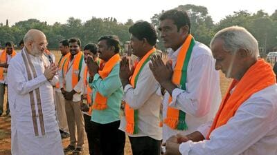 Union home minister Amit Shah being welcomed by BJP supporters on his arrival in Suryapet on Friday (ANI) Union home minister Amit Shah being welcomed by BJP supporters on his arrival in Suryapet on Friday (ANI)