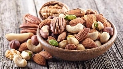 Mixed Nuts: Grab a handful of assorted nuts such as almonds, walnuts, and pistachios for a rapid energy boost and a dose of wholesome fats. (Shutterstock) Mixed Nuts: Grab a handful of assorted nuts such as almonds, walnuts, and pistachios for a rapid energy boost and a dose of wholesome fats. (Shutterstock)