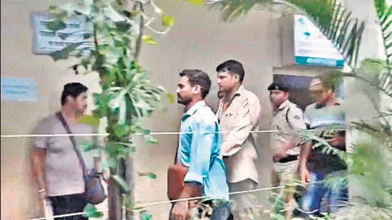 **EDS: SCREENSHOT VIA PTTI VIDEO** Mumbai: Railway Protection Force (RPF) jawan accused of shooting four persons dead on board the Mumbai-Jaipur Superfast Express train being brought to the Borivali Police Station, Monday, July 31, 2023. The incident took place near the Palghar railway station, around 100 km from Mumbai, while the train was on its way to Mumbai from Jaipur. (PTI Photo) (PTI07_31_2023_000017B) (PTI)