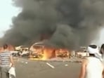 Egypt Accident: Images posted on social media showed an overturned lorry lying across the fast lane on charred tarmac. Egypt Accident: Images posted on social media showed an overturned lorry lying across the fast lane on charred tarmac.