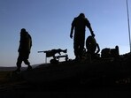 Israeli soldiers stand atop a Merkava tank during in a military drill near the border with Lebanon on October 26. Israeli soldiers stand atop a Merkava tank during in a military drill near the border with Lebanon on October 26.
