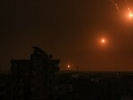 Flares fired by the Israeli army light up the sky east of Khan Yunis on the southern Gaza Strip on October 27, 2023. Flares fired by the Israeli army light up the sky east of Khan Yunis on the southern Gaza Strip on October 27, 2023.