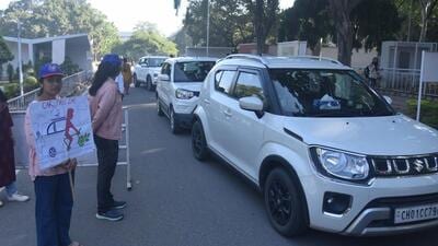 Cars being stopped from entering Panjab University on the car-free day. (Keshav Singh/HT) Cars being stopped from entering Panjab University on the car-free day. (Keshav Singh/HT)