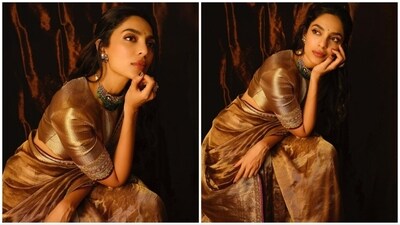 Sobhita Dhulipala elegantly embraces the vintage charm by wearing a splendid golden tissue silk saree designed by Manish Malhotra at the recently held Jio Mami Film Festival. (Instagram/@sobhitad) Sobhita Dhulipala elegantly embraces the vintage charm by wearing a splendid golden tissue silk saree designed by Manish Malhotra at the recently held Jio Mami Film Festival. (Instagram/@sobhitad)