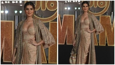 Tara Sutaria graced the red carpet in a peach-embellished outfit, blending together Western and ethnic influences to create a captivating and unique look. Tara Sutaria graced the red carpet in a peach-embellished outfit, blending together Western and ethnic influences to create a captivating and unique look.