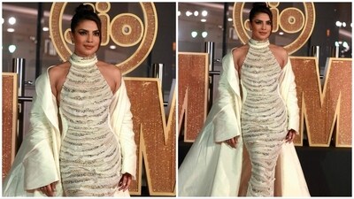 Priyanka Chopra looked utterly stunning in a white sheer gown. She opted for a striking makeup look and elegantly styled her hair in a sleek bun, enhancing her overall appearance. Priyanka Chopra looked utterly stunning in a white sheer gown. She opted for a striking makeup look and elegantly styled her hair in a sleek bun, enhancing her overall appearance.