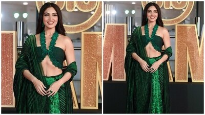Bhumi Pednekar elevated the glamour factor with her choice of a contemporary green saree adorned with modern embellishments and details. Bhumi Pednekar elevated the glamour factor with her choice of a contemporary green saree adorned with modern embellishments and details. 