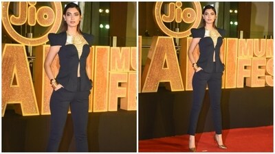 Diana Penty commanded attention on the red carpet in an effortlessly chic all-black ensemble. Her attire consisted of a black top paired with cropped pants. The standout feature of her look was the striking golden accessory adorning her neck. Diana Penty commanded attention on the red carpet in an effortlessly chic all-black ensemble. Her attire consisted of a black top paired with cropped pants. The standout feature of her look was the striking golden accessory adorning her neck.