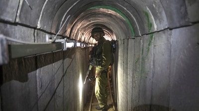 Israel-Hamas War: An Israeli army officer gives journalists a tour of a tunnel allegedly used by Palestinian militants for cross-border attack. (AP) Israel-Hamas War: An Israeli army officer gives journalists a tour of a tunnel allegedly used by Palestinian militants for cross-border attack. (AP)