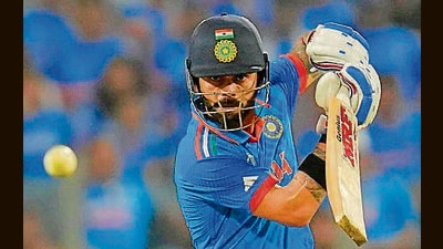 Kohli went past 26,000 runs in international cricket faster than anyone in history. At this World Cup, he has made 354 runs across just five games, an average of 118. (AP) Kohli went past 26,000 runs in international cricket faster than anyone in history. At this World Cup, he has made 354 runs across just five games, an average of 118. (AP)