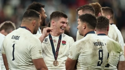 England's fly-half Owen Farrell (C) reacts with teammates during the medal ceremony after the France 2023 Rugby World Cup third-place match vs Argentina (AFP) England's fly-half Owen Farrell (C) reacts with teammates during the medal ceremony after the France 2023 Rugby World Cup third-place match vs Argentina (AFP)