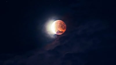 A lunar eclipse happens when the Earth comes between the Sun and the Moon during a full moon, making them line up. This upcoming eclipse in Aries is rare because it involves the Moon, Rahu, and Jupiter. Its effects will be felt by all zodiac signs. Read on to learn more. (Expert Credit: Neeraj Dhandkher) (Photo by Benjamin Voros on Unsplash) A lunar eclipse happens when the Earth comes between the Sun and the Moon during a full moon, making them line up. This upcoming eclipse in Aries is rare because it involves the Moon, Rahu, and Jupiter. Its effects will be felt by all zodiac signs. Read on to learn more. (Expert Credit: Neeraj Dhandkher) (Photo by Benjamin Voros on Unsplash)