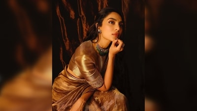 Sobhita Dhulipala enhanced her appearance with a striking contrast by wearing green kundan jewelry from Manish Malhotra's exclusive jewelry collection. (Instagram/@sobhitad) Sobhita Dhulipala enhanced her appearance with a striking contrast by wearing green kundan jewelry from Manish Malhotra's exclusive jewelry collection. (Instagram/@sobhitad)