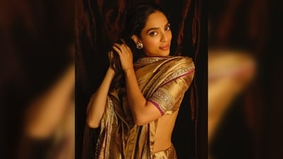 Sobhita Dhulipala donned a handwoven tissue saree adorned with exquisite antique zardosi craftsmanship, a creation by designer Manish Malhotra. (Instagram/@sobhitad) Sobhita Dhulipala donned a handwoven tissue saree adorned with exquisite antique zardosi craftsmanship, a creation by designer Manish Malhotra. (Instagram/@sobhitad)