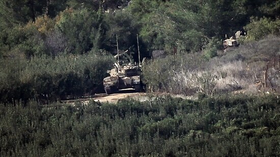 Israel-Hamas War: An Israeli tank advances on a road in northern Israel near the border with Lebanon. (AFP)