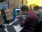 A share broker reacts as Sensex & Nifty prices plummet in Kolkata. A share broker reacts as Sensex & Nifty prices plummet in Kolkata.