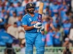 Indian captain Rohit Sharma celebrates his fifty. Indian captain Rohit Sharma celebrates his fifty.