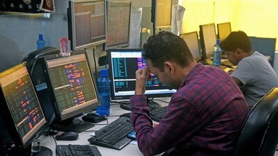 A share broker reacts as Sensex & Nifty prices plummet in Kolkata. (File) A share broker reacts as Sensex & Nifty prices plummet in Kolkata. (File)