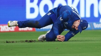 Liam Livingstone takes the catch to dismiss Rohit Sharma (REUTERS)