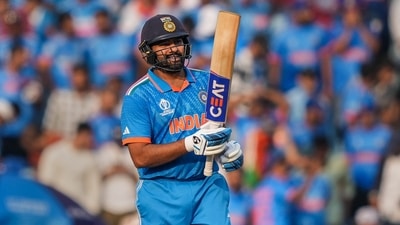 Indian captain Rohit Sharma celebrates his fifty. (PTI) Indian captain Rohit Sharma celebrates his fifty. (PTI)