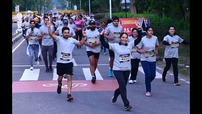 Participants during Punjab Half Marathon, organised by Thrill Zone to raise awareness against drug abuse, near Chandigarh Club on Sunday. (Keshav Singh/HT)