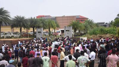 People gather after an explosion that killed a woman and injured several others, at a convention centre in Kochi (PTI) People gather after an explosion that killed a woman and injured several others, at a convention centre in Kochi (PTI)