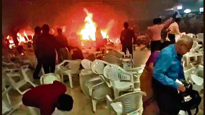 People rush to save themselves after the blast. (PTI) People rush to save themselves after the blast. (PTI)
