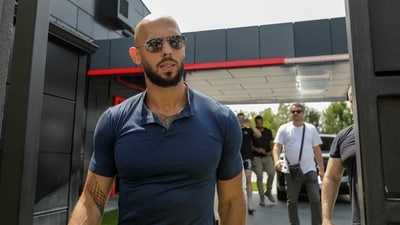 FILE PHOTO: Andrew Tate delivers a press statement outside his house in Voluntari, Ilfov, Romania, August 4, 2023. Inquam Photos/George Calin via REUTERS (via REUTERS)