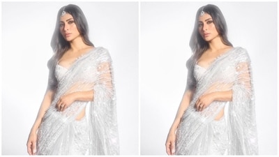 With the help of make-up artist Mukesh Patil, Mouni got decked up in nude eyeshadow, smudged eyeliner, mascaraed lashes, contoured cheeks, glowing highlighter and a shade of light pink lipstick. (Instagram/@imouniroy) With the help of make-up artist Mukesh Patil, Mouni got decked up in nude eyeshadow, smudged eyeliner, mascaraed lashes, contoured cheeks, glowing highlighter and a shade of light pink lipstick. (Instagram/@imouniroy)